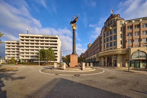 Störtebeker House in the architectural style of neo-historicism, granite column with metal