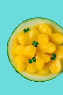 Yellow mini watermelon, Sliced in the shape of a heart, top view, no people, close-up, selective