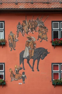 Wall painting on a residential building, showing the Kinderzeche, commemorating the peaceful