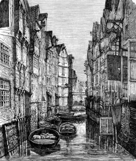 Fleet as a transport route in the old town of Hamburg, barges for transporting goods, densely