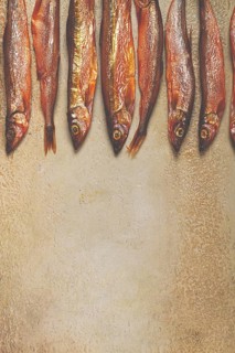 Cold smoked capelin, on the table, top view, no people