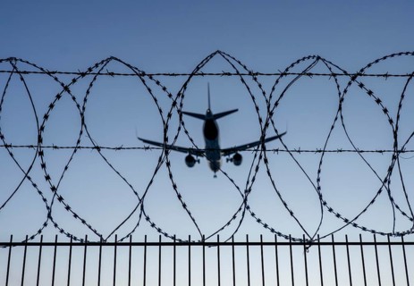 Symbolic image security at the airport, outer fence at Düsseldorf International Airport, steel wire