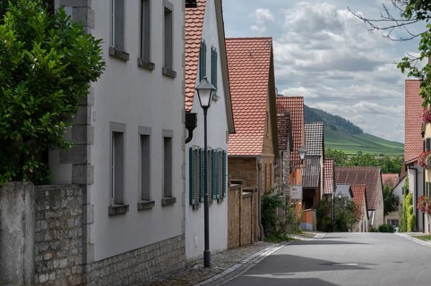 Historic winegrowers' houses on the village street of Hüttenheim, Lower Franconia, Bavaria,