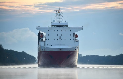 RoRo cargo ship Super Fast Levante travelling through the Kiel Canal at sunrise, Kiel Canal,