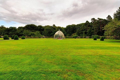 Garden, lawn with greenhouse on the horizon, Muckross House & Gardens, Killarney National Park,