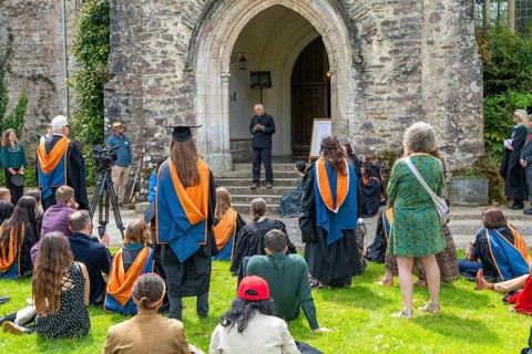 Satish Kumar speaking at graduation event, Schumacher College, Dartington Hall estate, Totnes,