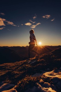 Trail running in autumn on the Jochberg on Lake Walchensee against the wonderful backdrop of the