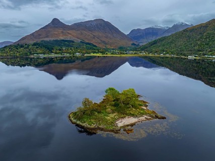 Mountains reflected in fjord, coast, island, autumn, cloudy, aerial view, Loch Leven, view of