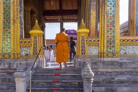 Wat Phra Kaeo temple, royal palace. Royal chapel with Buddhist monks and novices. Bangkok,