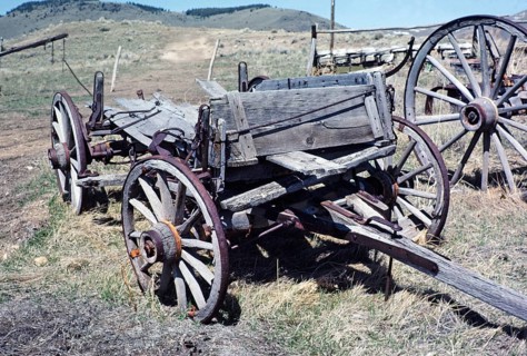 Nevada City historic ghost town, Montana, USA old broken down wooden wagons