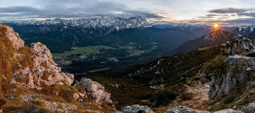 Mountain panorama with Wetterstein mountains, mountain landscape with sun star at sunset, at the