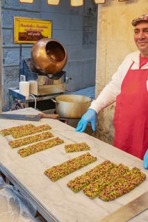 Person making traditional nougat, Ortygia, Syracuse, Sicily, Italy, Europe
