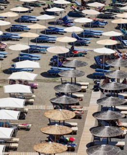 Parasols on Agia Galini beach, Agia Galini, south coast, Crete, Greece, Europe