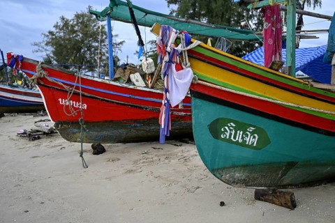 Fishing boats on the beach of Chathing Phra, near Hat Yai, Songkhla province, Thailand, Asia