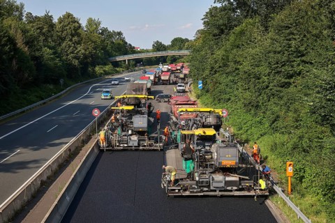 Essen, North Rhine-Westphalia, Germany, Road construction, Asphalt pavers and road rollers lay new,