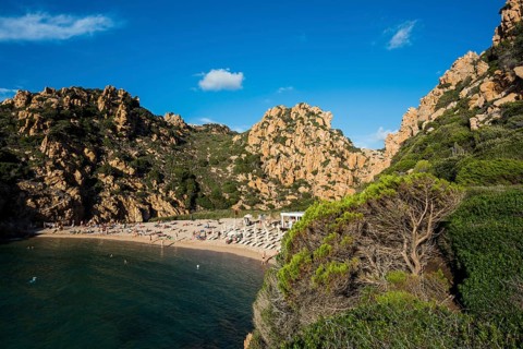Red rocks and picturesque beach, Spiaggia di Cala li Cossi, Costa Paradiso, Sardinia, Italy, Europe