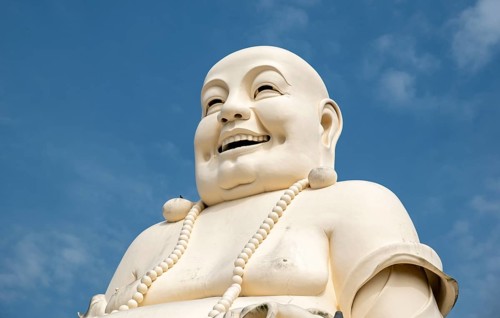 Statue of Budai - Laughing Buddha, Vinh Trang Temple, My Tho, Mekong Delta, Vietnam, Asia
