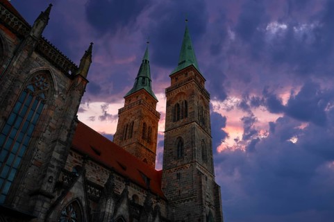 Towers of St Sebald's Church in the evening light, Nuremberg, Middle Franconia, Bavaria, Germany,