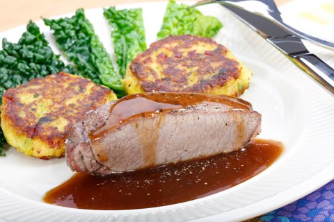 Swabian cuisine, medallions of wild boar with savoy cabbage cakes, meat dish, roasted, hearty, home