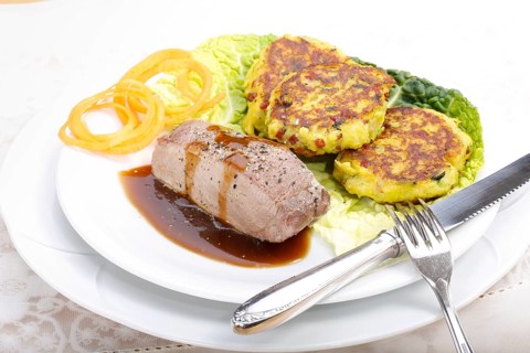 Swabian cuisine, medallions of wild boar with savoy cabbage cakes, meat dish, roasted, hearty, home