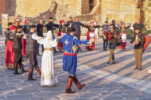 Group of people performing traditional Greek dance, Chania, Crete, Greek Islands, Greece, Europe