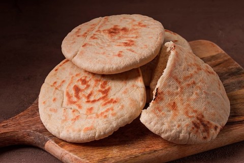 Pita bread, stack, on the table, no people