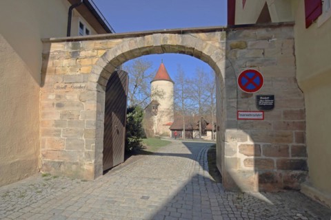 Archway of the historic municipal building yard with digestion tower, Dinkelsbühl, Middle