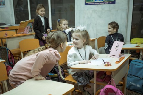 Pupils in a classroom in one of the metro schools in Kharkiv. Classrooms were set up in various