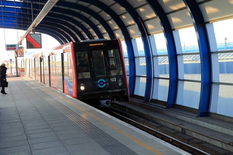 Docklands Light Railway train at City Airport station, London, England, UK