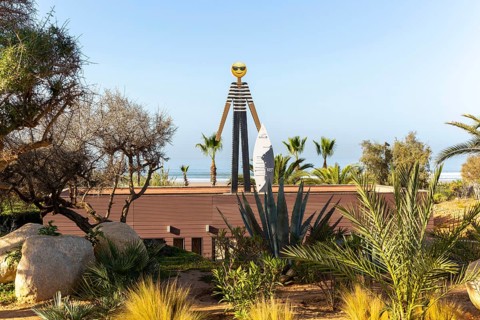 Surf school sign figure and surfboard, Radisson Blu Resort, Taghazout Bay Surf Village, Taghazout,