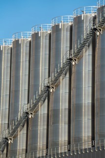 Stainless steel tanks of a large silo facility in Duisburg inland harbour, Duisburg-Neuenkamp, for