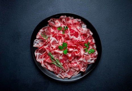 Sliced cured ham, prosciutto, italian dish, delicacy, parma ham, top view, no people
