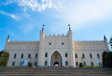Front view of a historic castle with stairs and blue sky, castle with museum, Lublin, Poland,