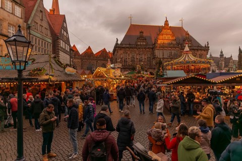 Christmas market at the historic town hall of the Hanseatic city of Bremen, market square in the
