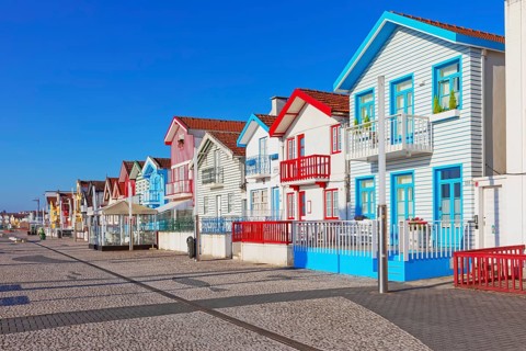 Brightly painted beach homes, Costa Nova do Prado, Aveiro, Portugal, Europe