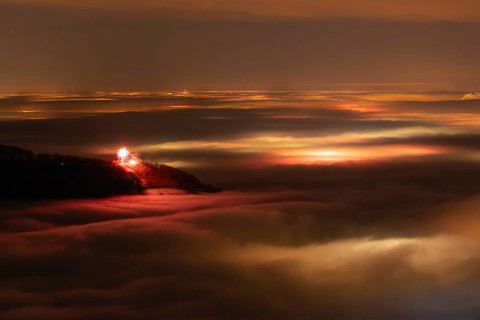 New Year's Eve fireworks 2024 on the Breitenstein, Swabian Alb near Ochsenwang. Sea of fog in the