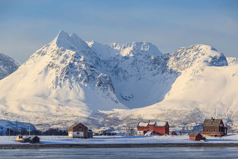 Farm, houses, coast, sea, mountains, snow, winter, sunny, Lyngen Alps, Norway, Europe