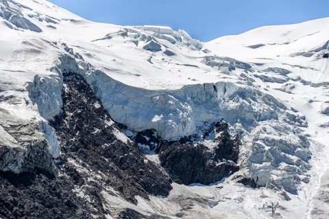 Rutted glacier ice with crevasses, high alpine mountain landscape, La Jonction, Chamonix,