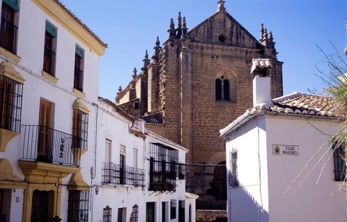 Cathedral church set among historic whitewashed houses in the old town of Ronda, Andalucia, Spain,