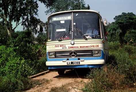 Mercedes Benz coach on a dirt road to Vaama, Sierra Leone, West Africa 1978, Africa