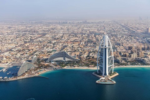 Dubai Burj Al Arab luxury hotel aerial view aerial view by the sea from above in Dubai, United Arab