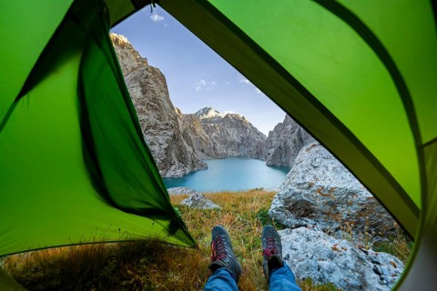 Wild camping, camping in the wilderness with a tent, Kol Suu mountain lake, Sary Beles Mountains,