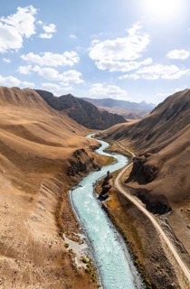 Mountain valley with wild river between hills, Bolgart Valley, Naryn Province, Kyrgyzstan, Asia
