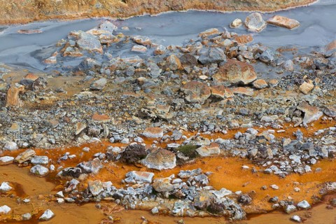 Solfatara field with hot pools and boiling mud at Seltun, Reykjanes nature reserve