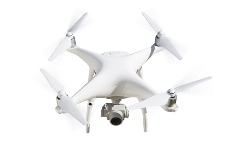 Unmanned aircraft system (UAV) quadcopter drone isolated on white