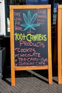 Advertising board on a cannabis shop in the pedestrian zone of The Hague, Holland, Netherlands
