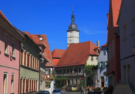 Houses in the centre of the village and the steeple of St John the Baptist Church, Mainbernheim,