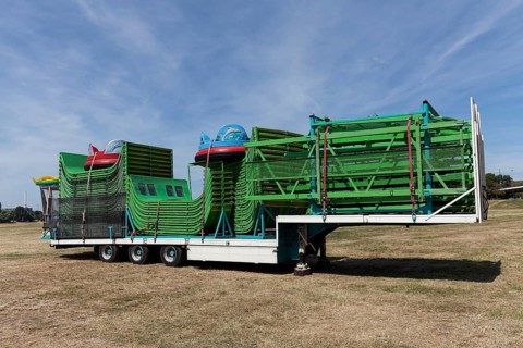 Truck semi-trailer, loaded with construction parts of a ride, Rheinkirmes superstructure,