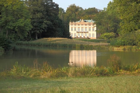 Landscape with classicist castle and reflection in the lake, Schönbusch Park, Aschaffenburg, Lower