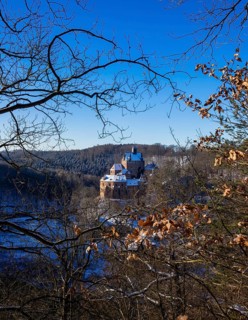 Kriebstein Castle rises on a steep rock above the Zschopau. Within the large group of hilltop